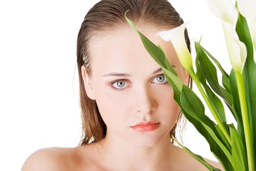 Beauty face of the young beautiful woman with flower. Girl on white background