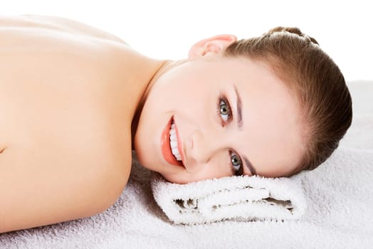 beauty young woman relaxing in a spa. isolated on white.