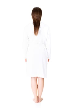 beautiful caucasian woman in bathrobe standing back to the camera,isolated on white background