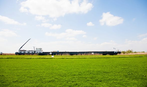 Inland navigation on a canal near Nijkerk in the Netherlands.