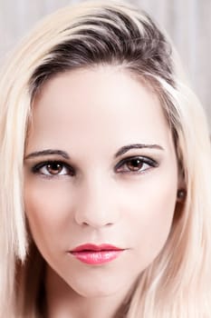 high key portrait of attractive blonde woman