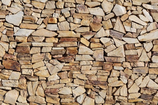Details of an outdoors stone wall in Spain.