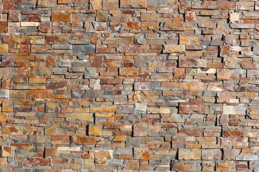 Details of an outdoors stone wall in Spain.