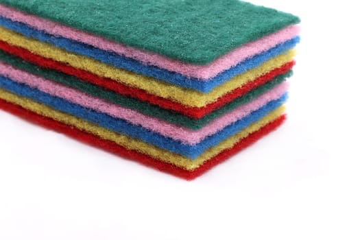 A pile of sponges in different colors