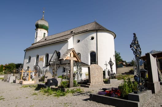 Cemetery with church in Grän Tirol
