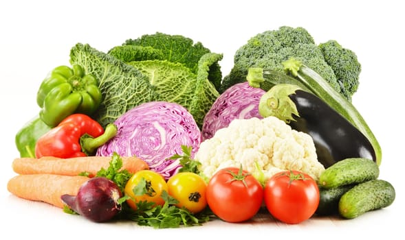 Composition with variety of fresh organic vegetables isolated on white