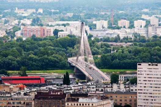 panorama of warsaw city with modern bridge