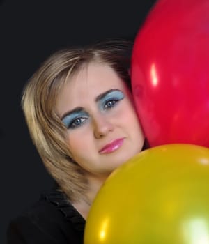 happy cute woman with balloons