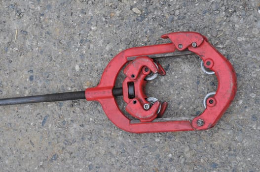 Road works construction site tool to cut pipes