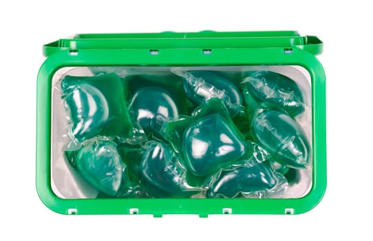 Green gel laundry capsules in box