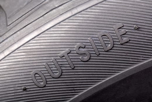 inscription on the new wheel close-up "outside"""