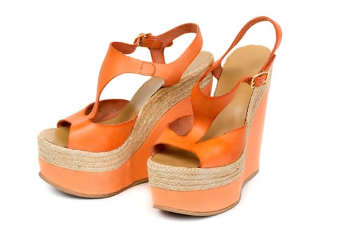 Paur sexy orange sandal with white background