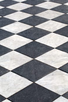 Black and white checkered marble floor pattern