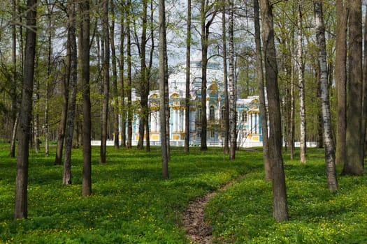 Pavilion in Catherine`s park in Tsarskoe Selo near Saint Petersburg, Russia through the woods
