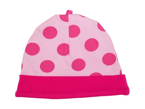 Pink baby hat with polka dots on a white background