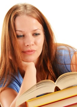 Young woman reading a book. Female student learning