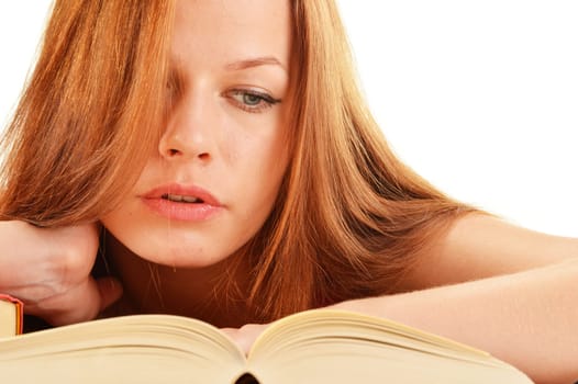 Young woman reading a book. Female student learning