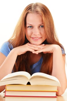 Young woman reading a book. Female student learning