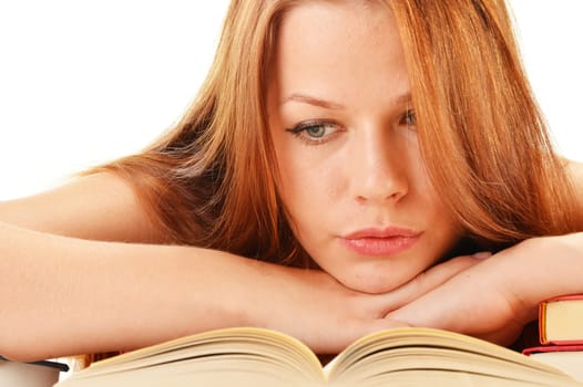 Young woman reading a book. Female student learning