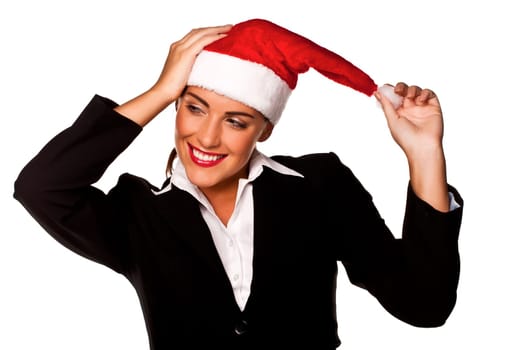 A beautiful young businesswoman wearing a Santa hat on a white background.