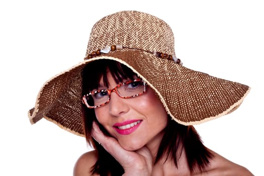 A beautiful woman wearing a hat and sunglasses.