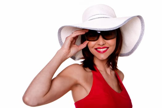 A beautiful woman wearing a hat and sunglasses.