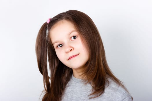 teenage girl on a light background. portrait
