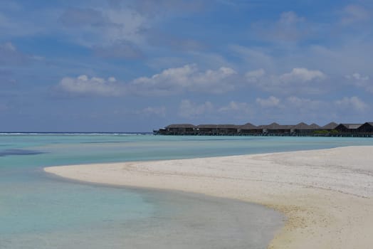 happy young couple have fun and relax at summer vacation on background maldives travel location and beautiful white sand beach