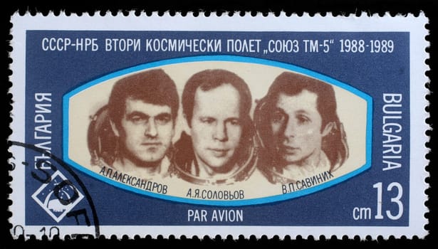 BULGARIA- CIRCA 1989: A stamp printed in Bulgaria shows Cosmonauts Anatoly Solovyev, Viktor Savinykh, Aleksandr Panayatov Aleksandrov of space ship Soyuz TM-5, circa 1989