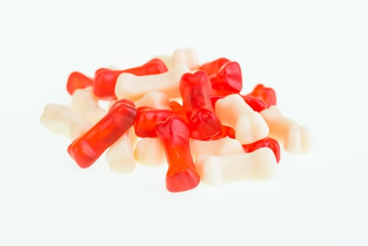 Red and cream gummy bones candy