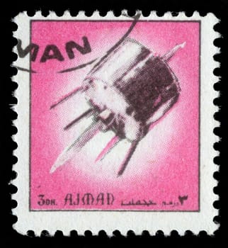 AJMAN - CIRCA 1972: A stamp printed in emirate Ajman show spaceship, circa 1972