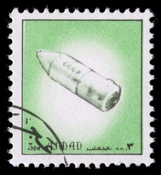 AJMAN - CIRCA 1972: A stamp printed in emirate Ajman show spaceship, circa 1972