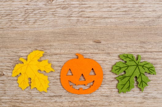 Orange pumpkin on Halloween with foliage and text space