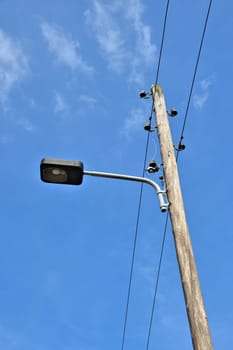 Street lamp and overhead line