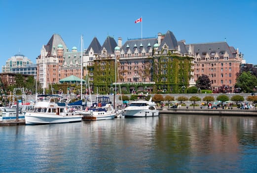 VICTORIA, BRITISH COLUMBIA, CANADA - JULY 7: The Fairmont Empress Hotel facade on July 7, 2013 in Victoria, British Columbia, Canada. Commonly known as The Empress, it is among the oldest and most prominent hotel in Victoria. It has been designated as a National Historic Site of Canada due to its national importance.