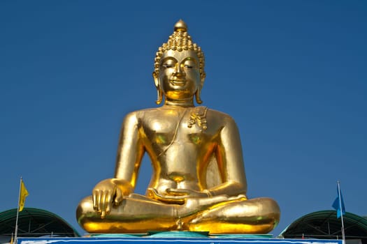 Big Buddha statue under the blue sky.