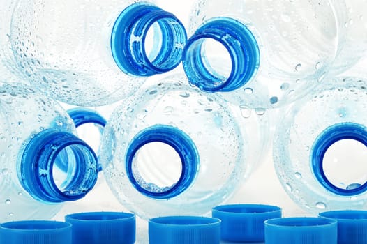 Composition with empty polycarbonate plastic bottles of mineral water