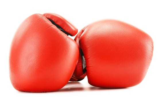 Pair of red leather boxing gloves isolated on white
