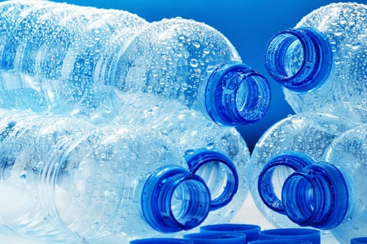 Composition with empty polycarbonate plastic bottles of mineral water