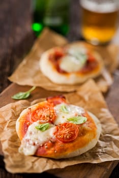Small pizzas and beer close up shoot