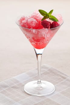 Raspberry granita in glass close up shoot