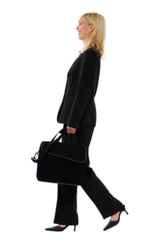 young happy blond business woman walking isolated on white