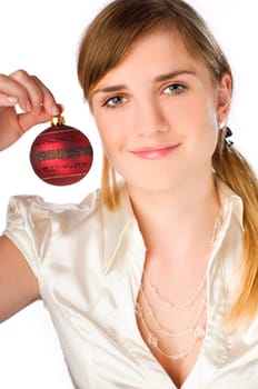 young brunette girl with red ornament on white