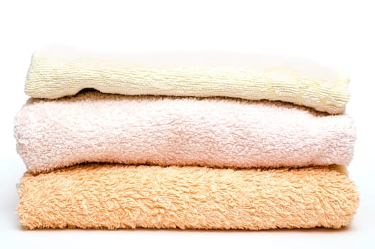 Stack of towels against a white background