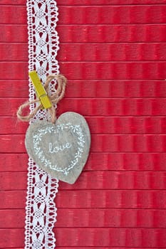 Red background with a heart with the inscription LOVE