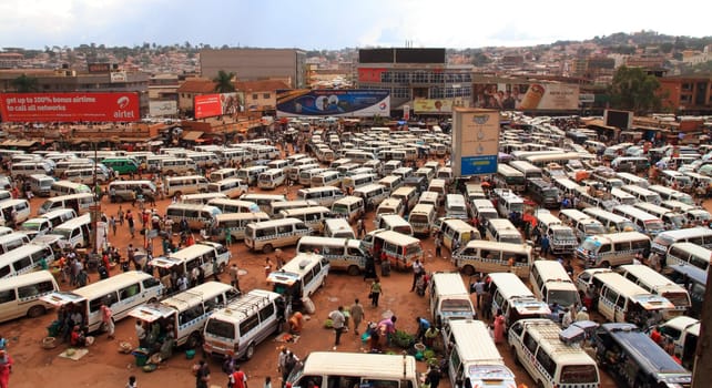 KAMPALA, UGANDA - SEPTEMBER 28, 2012. The busy and chaotic taxi park on a normal week day in Kampala, Uganda on September 28,2012.