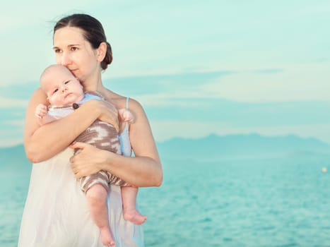 Baby and mom on the beach