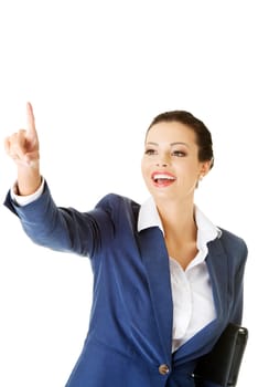 Young beautiful businesswoman making choose on abstract screen