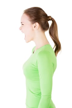 Young casual woman screaming with anger, isolated on white