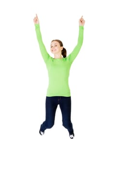 Young happy caucasian woman jumping in the air , isolated on white background